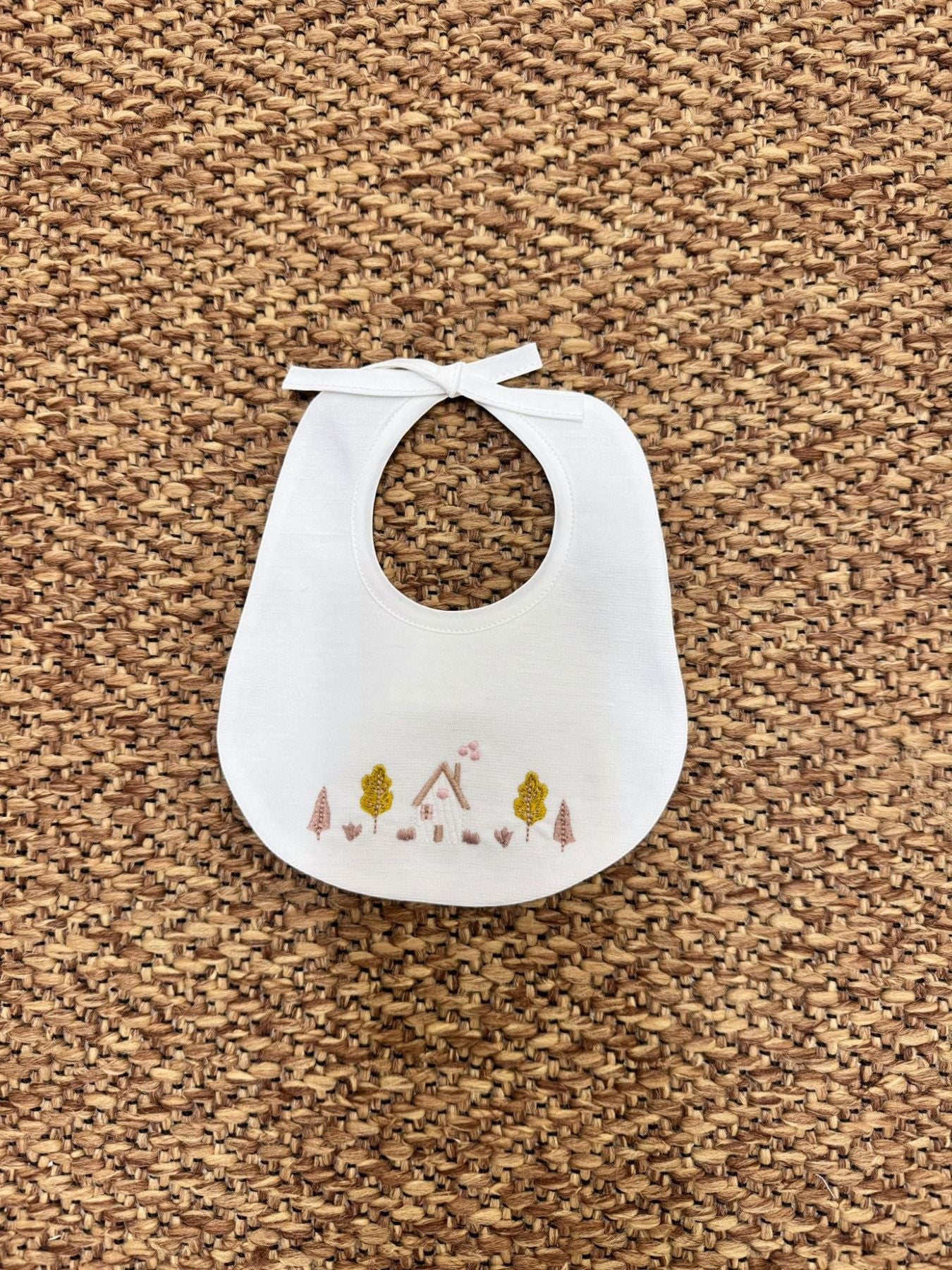 Bib with little houses and trees design, for baby girls, color: cream, item number: IG61BAV