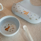 Bavetta in silicone Blu 108034565408 corredino e abbigliamento neonato | NANU' BABY