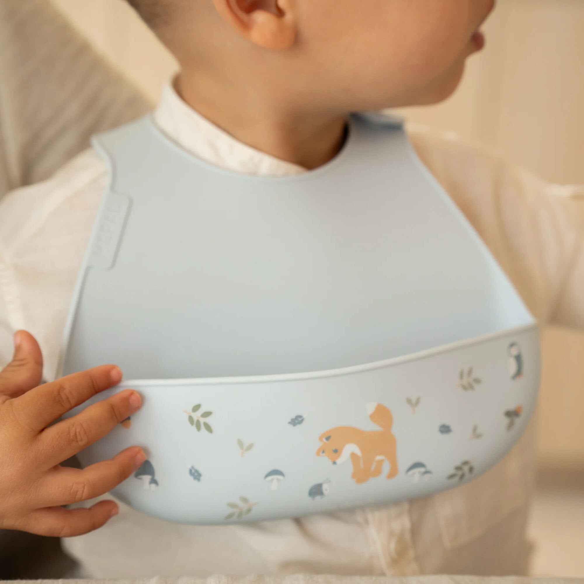 Bavetta in silicone Blu 108034565408 corredino e abbigliamento neonato | NANU' BABY