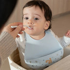 Bavetta in silicone Blu 108034565408 corredino e abbigliamento neonato | NANU' BABY